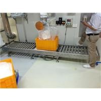 Cân trên băng chuyền